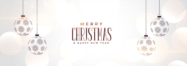 Free vector white christmas banner with hanging balls