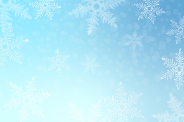 Free vector winter background with snowflakes