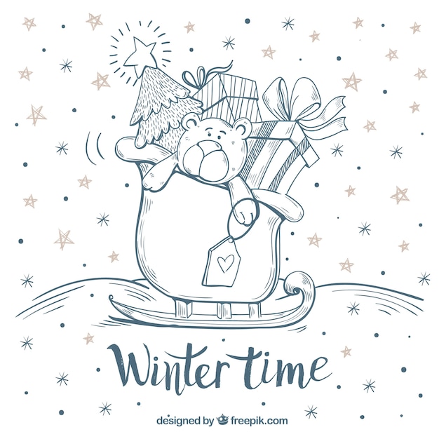 Free vector winter time hand drawn background with a teddy bear