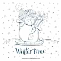 Free vector winter time hand drawn background with a teddy bear