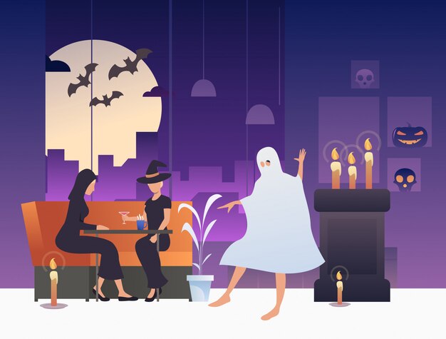 Witches drinking cocktails while ghost dancing in bar 