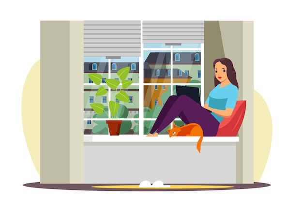 Woman freelancer working at laptop sitting on windowsill remote worker at home office with cat