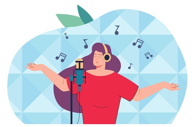 Woman in headphones singing recording in studio