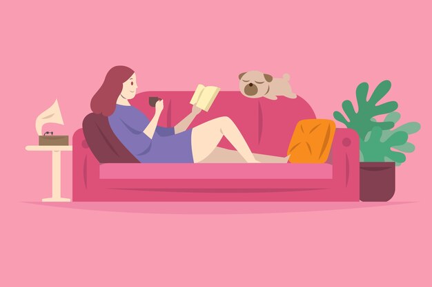 本を読みながらリラックスできるソファの上の女性