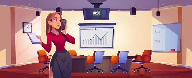 オフィスの会議室で電話を話す女性