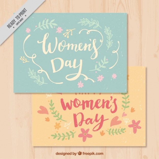 Free vector women's day card with floral decoration in pastel colors