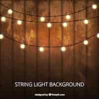 Free vector wooden background with decorative lightbulbs