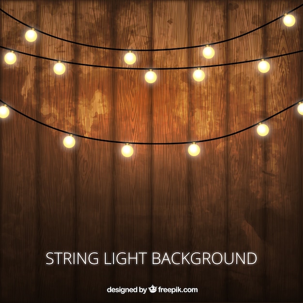 Wooden background with decorative lightbulbs