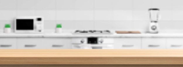 キッチンの木製カウンタートップは背景をぼかします