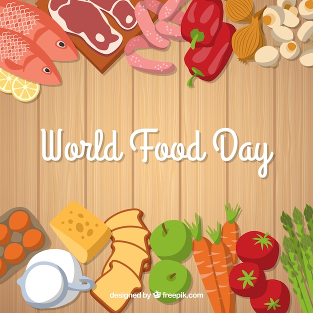 Free vector world food day on wooden background