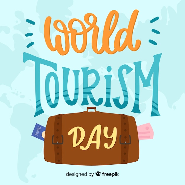 Free vector world tourism day lettering background