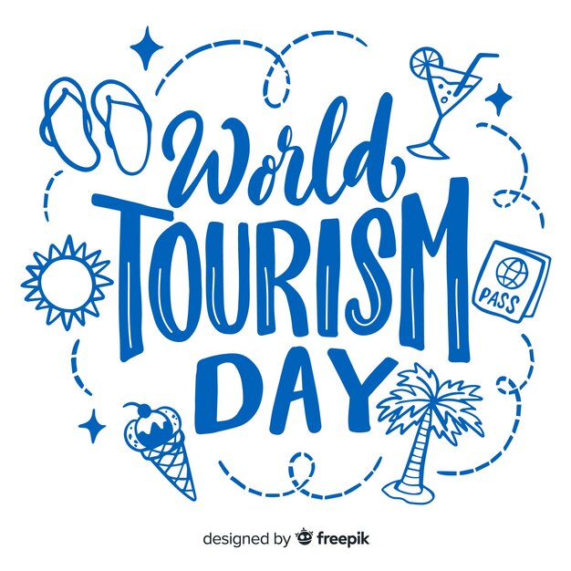 World tourism day lettering with travel items