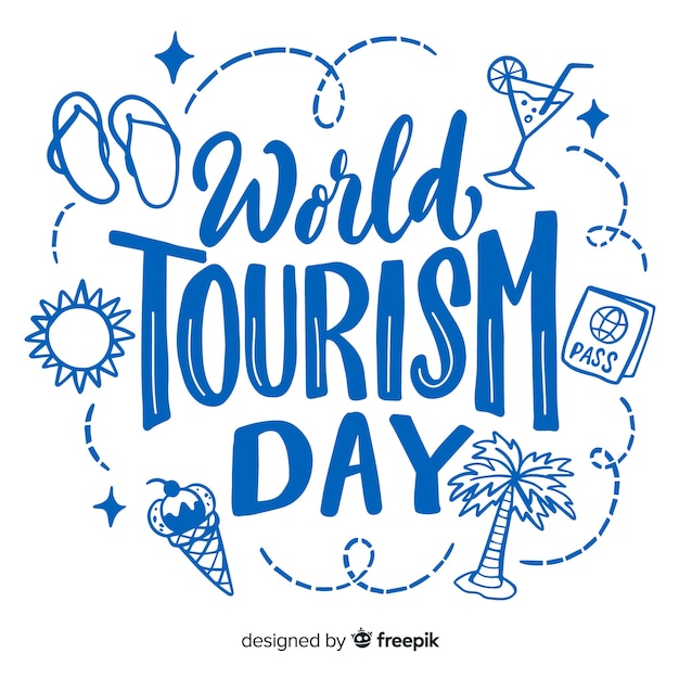 World tourism day lettering with travel items