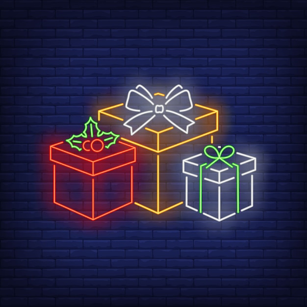 Free vector xmas presents in neon style