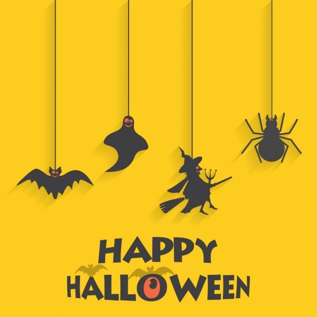 Free Vector yellow background with halloween elements