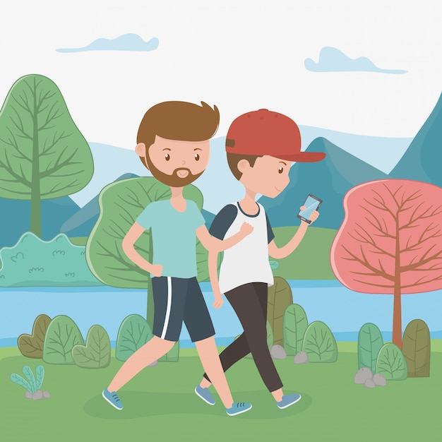 Free vector young boys walking using smartphones in the park