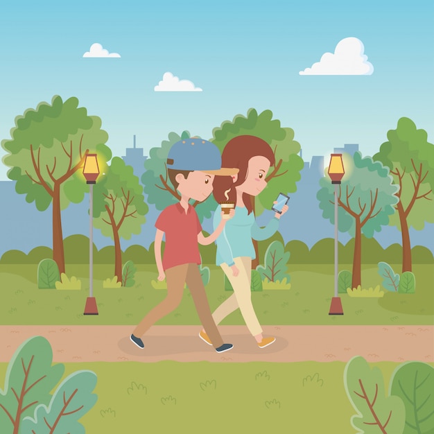 Молодая пара гуляет в парке персонажей