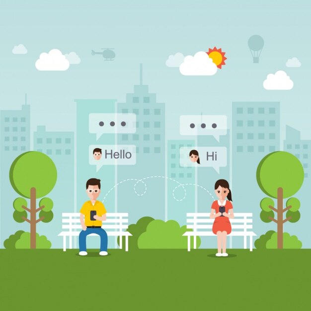 Young people talking on the phone in a park