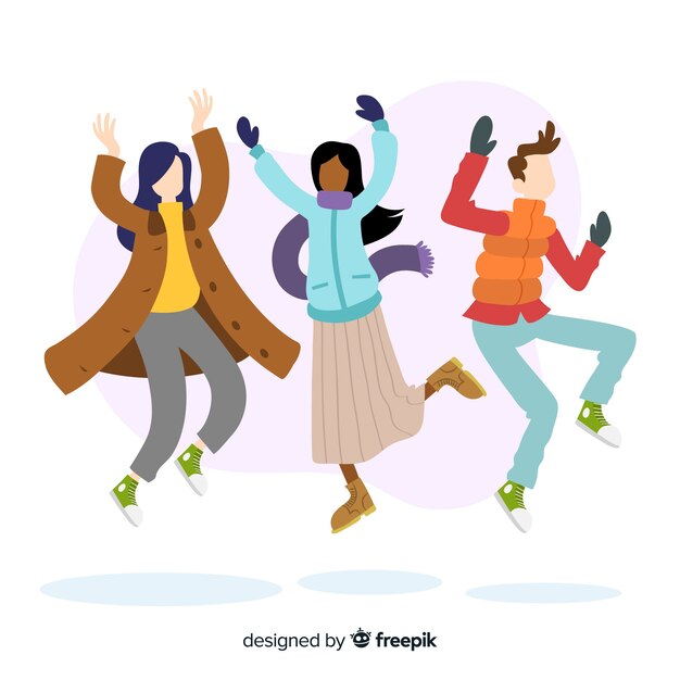 Young people wearing winter clothes jumping