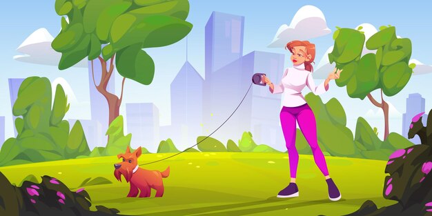 Young woman walking dog in summer city park