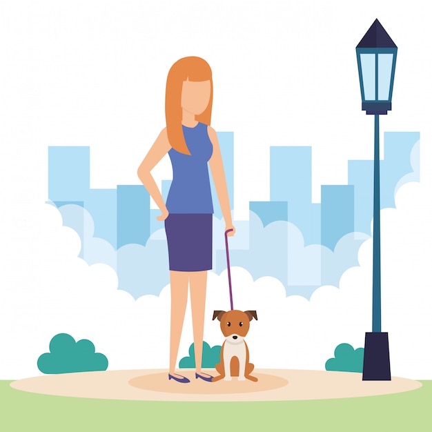 Young woman with dog in the park