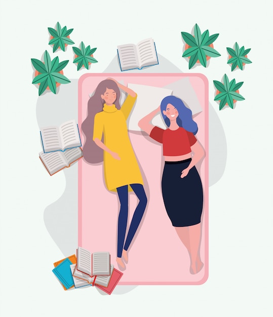 Free vector young women relaxing in mattress in the bedroom