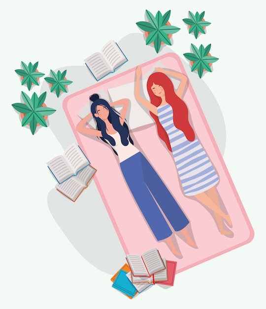 Free vector young women relaxing in mattress in the bedroom