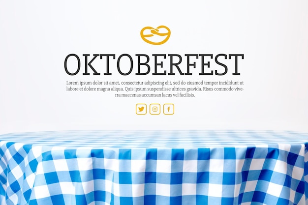 Kostenlose PSD banner für das oktoberfest mit text auf blau kariertem tischhintergrund