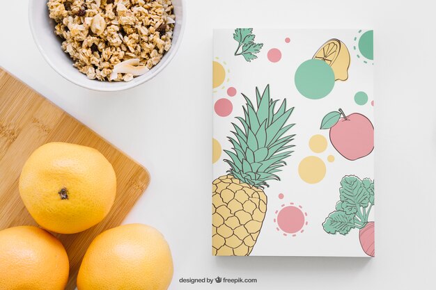 Kostenlose PSD buchcover mockup mit grapefruits