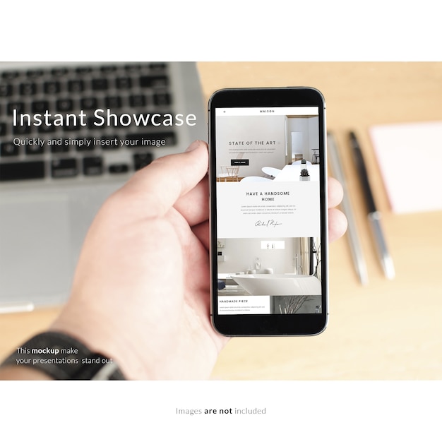 Kostenlose PSD hand hält ein smartphone mock up