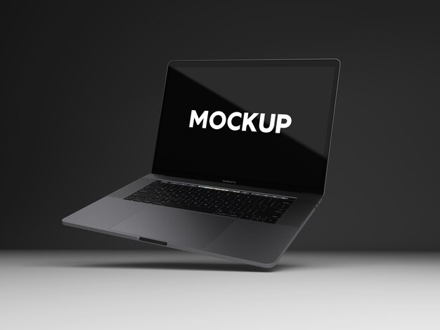 Laptop auf schwarzem Hintergrund mock up Design