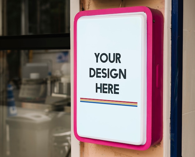 Kostenlose PSD modernes shopzeichenmodell mit mutigem rosa rahmen