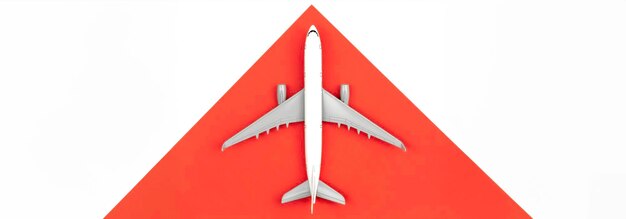 airplane on a red and white background flat lay travel concept