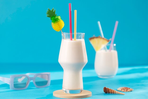 delicious cocktails on blue background