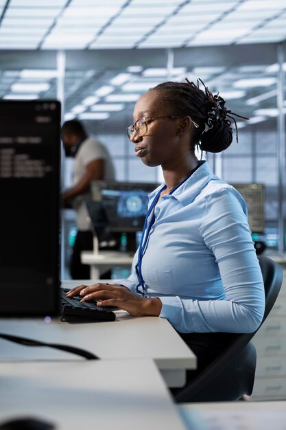 Engineer in data center managing and optimizing large scale IT infrastructure