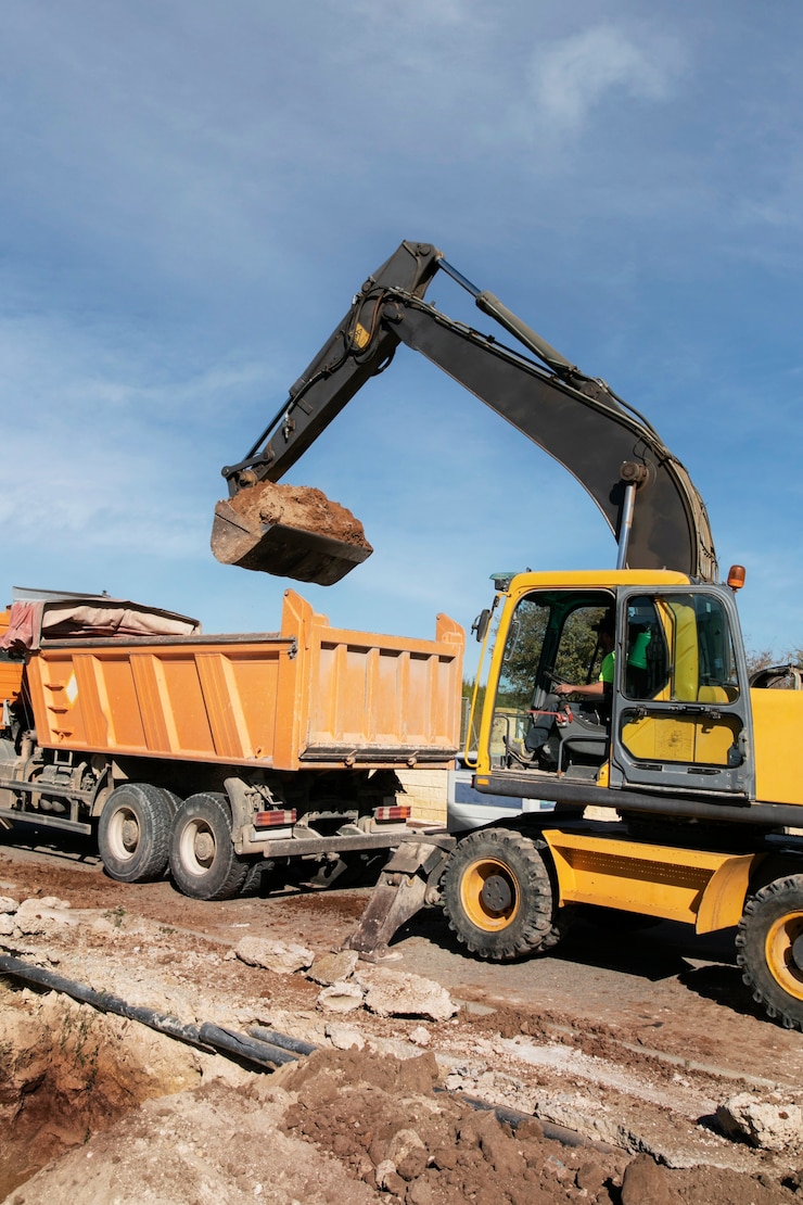 Gratis Foto excavator digging in the ground on day light
