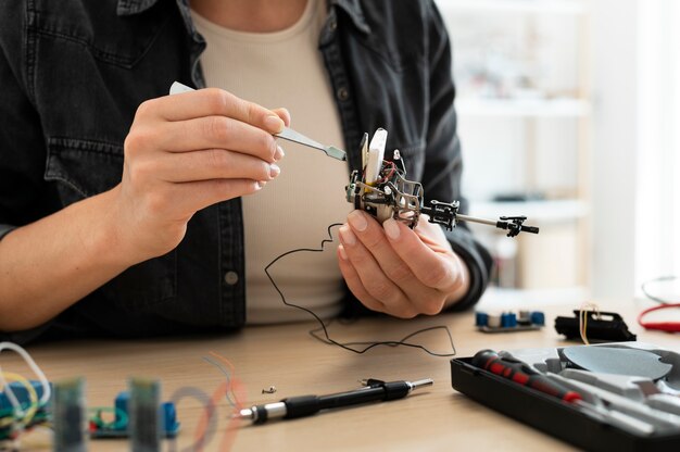 Female inventor working at a new creation