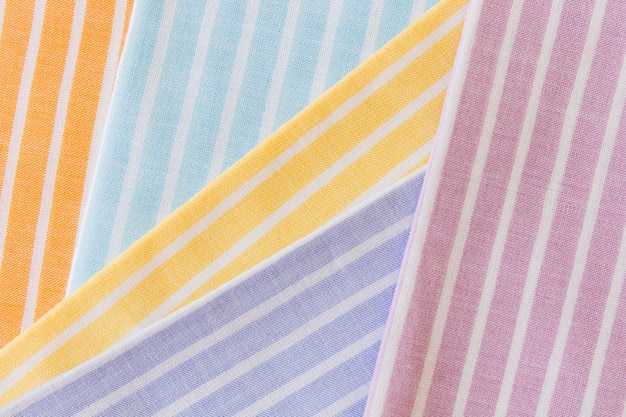 High angle view of various multi colored stripes pattern textile