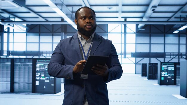 IT expert managing data center with advanced technology