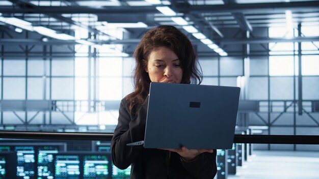 Server room worker under pressure to secure sensitive data after threat alert