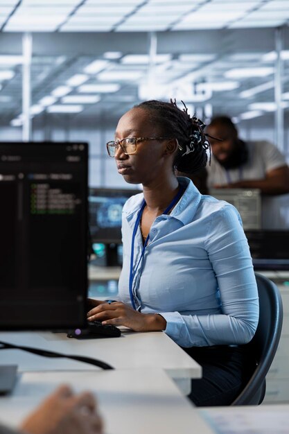 system administrator in data center optimizing it infrastructure