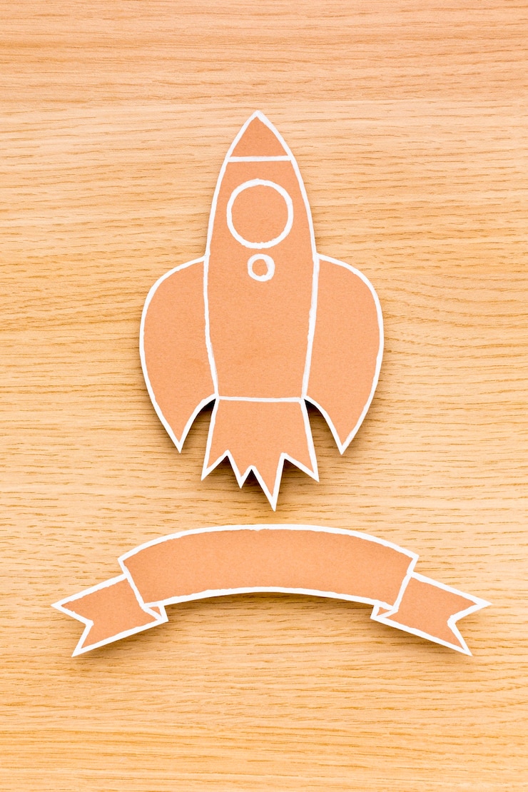Gratis Foto top view of rocket with ribbon for back to school season