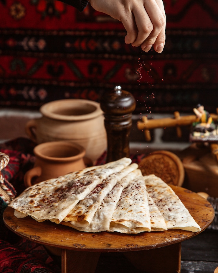 Gratis Foto traditional qutabs topped with sumakh