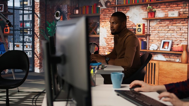 upset programmer annoyed by computer bugs while coding in it startup office