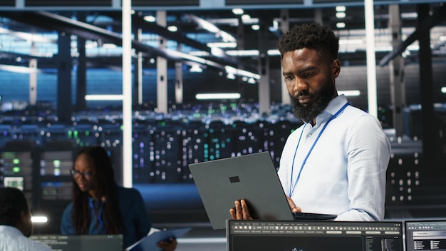 Data center engineer doing node tree programming to optimize resource allocation server farm