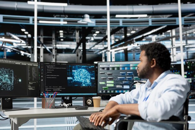 engineer with paraplegia using ai visualization tools in inclusive data center
