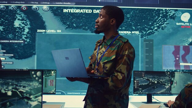 military sergeant targeting enemy vessels on a gps satellite world map