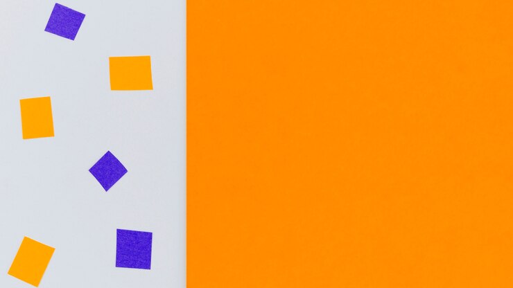 Gratis Bild orange and purple confetti with copy space