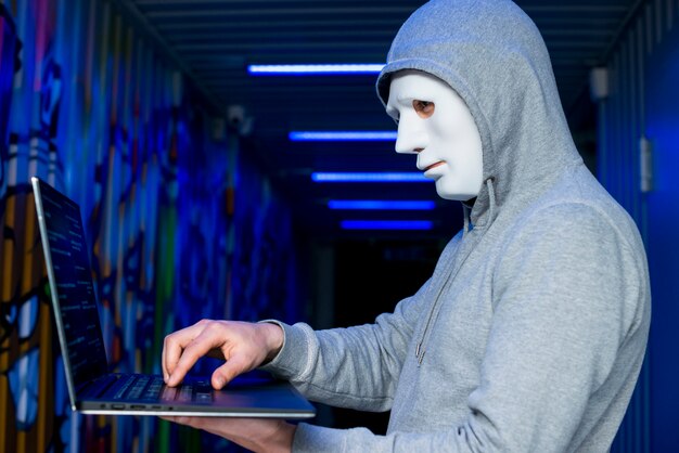 Portrait of hacker with mask