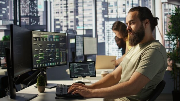 Portrait of smiling machine learning infrastructure engineer developing algorithms